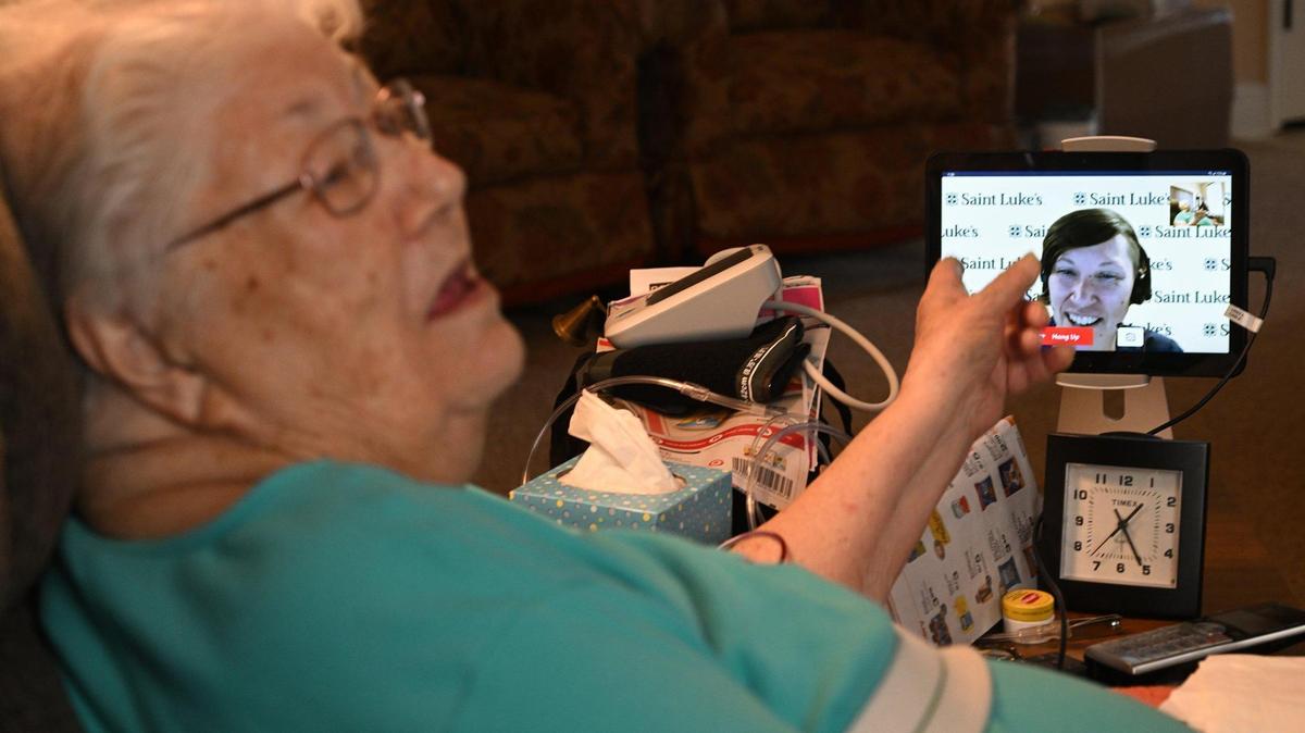 Delores Saunders of Grain Valley was one of the first Saint Luke’s patients to participate in its new Hospital in Your Home program, a hybrid of virtual and in-person care. Here she talks with nurse Amy Brackee via iPad, connecting her instantly, 24/7, to a command center at Saint Luke’s East.