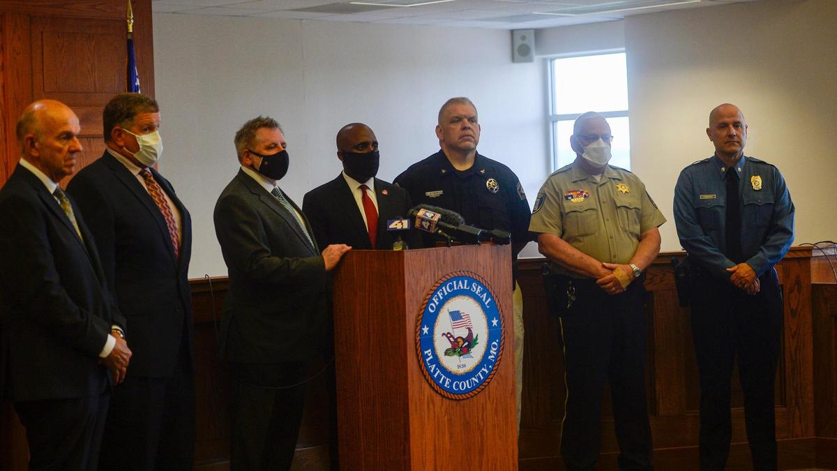 From left to right Ron Holliday, Buchanan County prosecuting attorney, Dan White, Clay County prosecuting attorney, Eric Zahnd, Platte County prosecuting attorney, Quinton Lucas, Kansas City mayor, Bill Puet, Buchanan County sheriff, Mark Owen, Platte county sheriff, and Mark Francisco, Deputy Chief investigation bureau, at a press conference addressing violent crime trends in and around Kansas City on Monday, July 6, 2020 at the Platte County Administration Building.