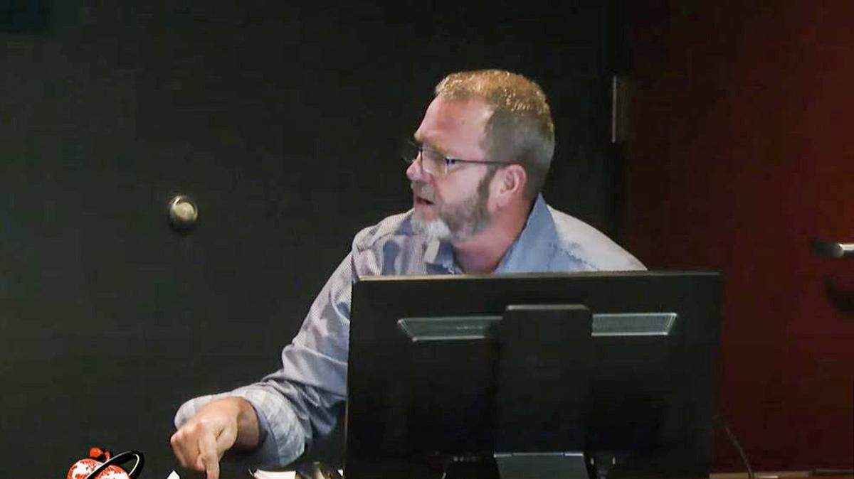 Olathe school board member Brian Connell shouted over fellow members at a July meeting during a debate over public access and transparency.