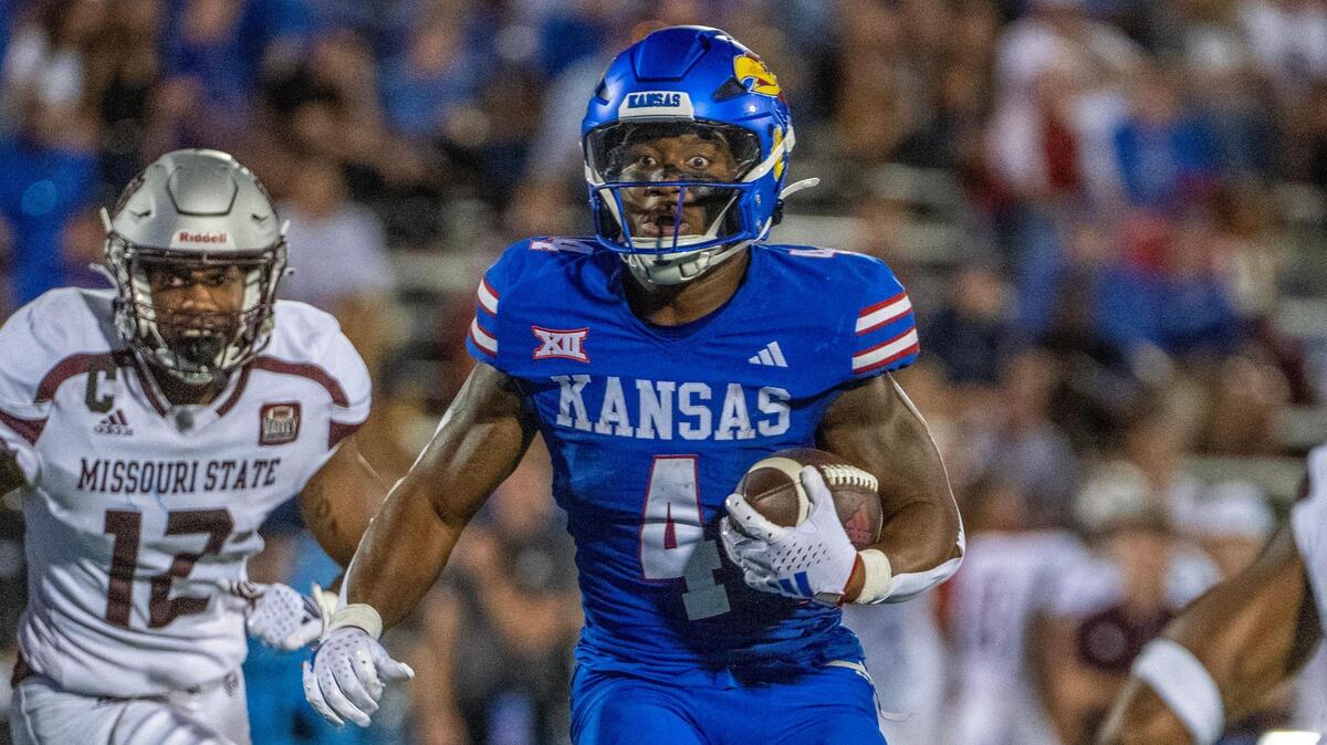Kansas Jayhawks running back Devin Neal (4) approaches the end zone for a touchdown in the fourth quarter during the season opener against the Missouri State Bears at David Booth Kansas Memorial Stadium on Friday, Sept. 1, 2023, in Lawrence, Kan.