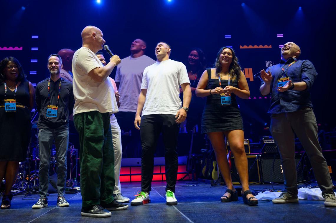 Comedian Jeff Ross, with mic, roasted the Kansas City Chiefs’ George Karlaftis and other members of the audience during the Big Slick Party & Show.