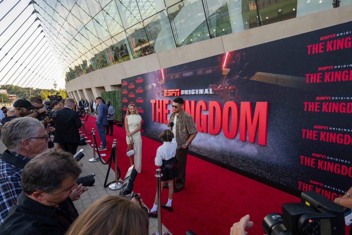 Patrick Mahomes speaks with content creator Taylen Biggs on the red carpet before the special screening of the ESPN six-part series ‘The Kingdom,’ on Sunday, Aug. 24, 2025, in Kansas City.
