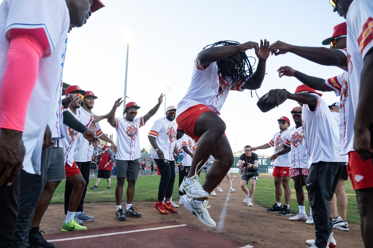 Kansas City linebacker Nick Bolton celebrates a home run during the Kansas City Charity Softball Game on June 6, 2024, at Legends Field in Kansas City, Kansas.
