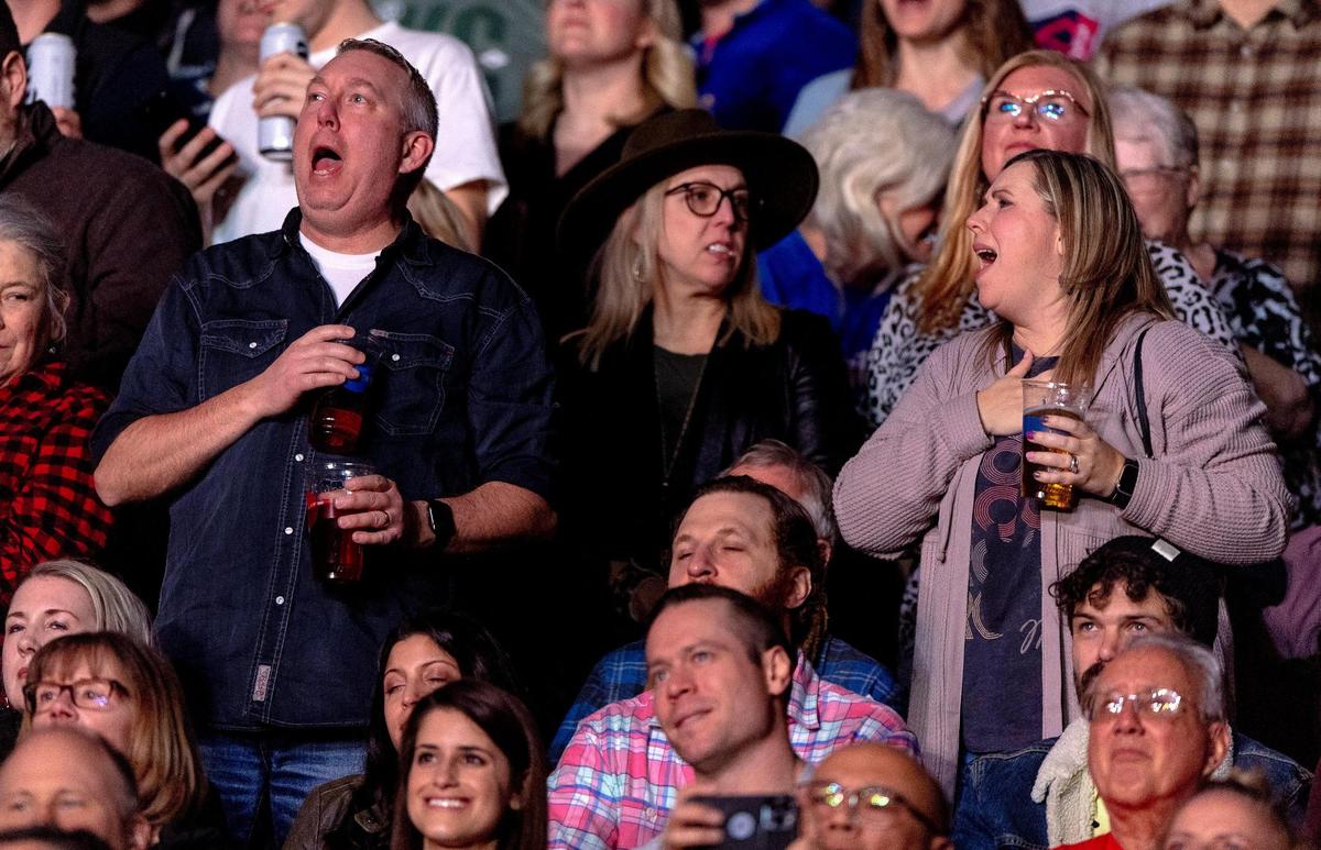 People sing along to Bruce Springsteen and The E Street Band as they perform at T-Mobile Center on Saturday, Feb. 18, 2023, in Kansas City.
