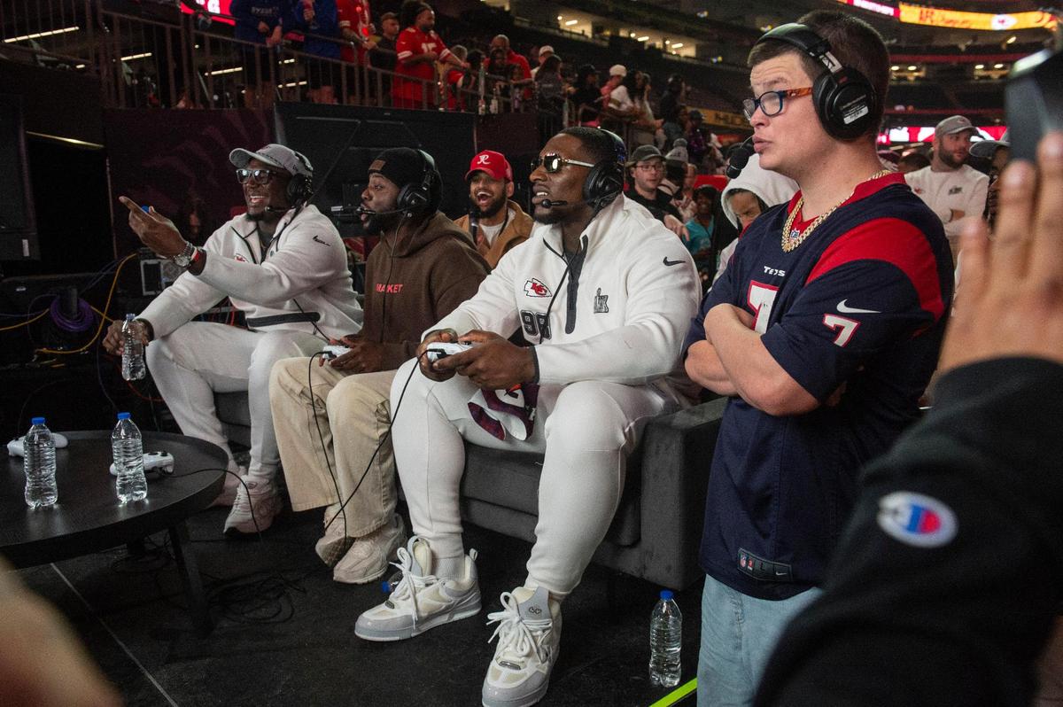 Kansas City Chiefs’ players play Madden NFL, a video game, during opening night of the Super Bowl at Caesars Superdome in New Orleans on Monday, Feb. 3, 2025.