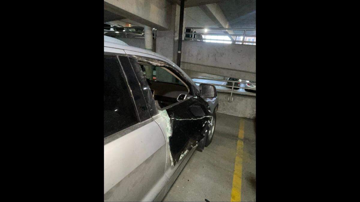 The vehicle of a victim whose car was broken into at a parking garage located at 1120 Oak St.