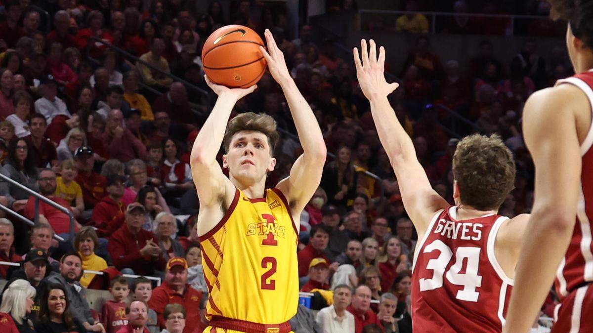 Iowa State Cyclones guard Caleb Grill shoots over Oklahoma Sooners forward Jacob Groves during the second half at Hilton Coliseum in Ames, Iowa, on Feb. 25, 2023.
