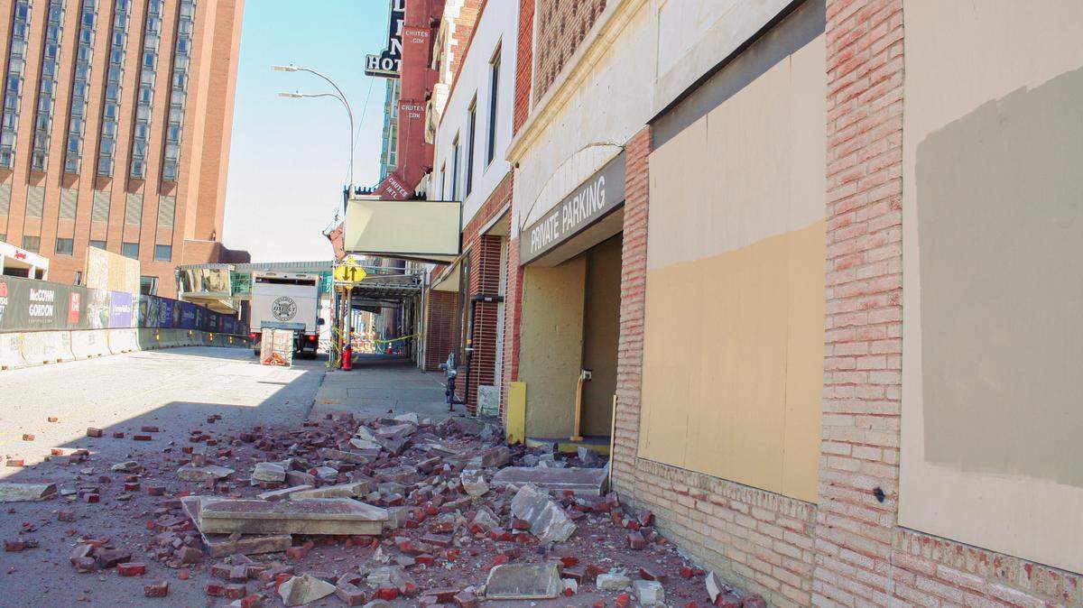 Part of the facade and some of the parapet separated from a downtown Kansas City parking garage Tuesday evening, sending bricks crashing to the sidewalk and street below, said Battalion Chief Riley Nolan with the Kansas City Fire Department. Kansas City police closed Wyandotte Street between 12th and 13th streets overnight.