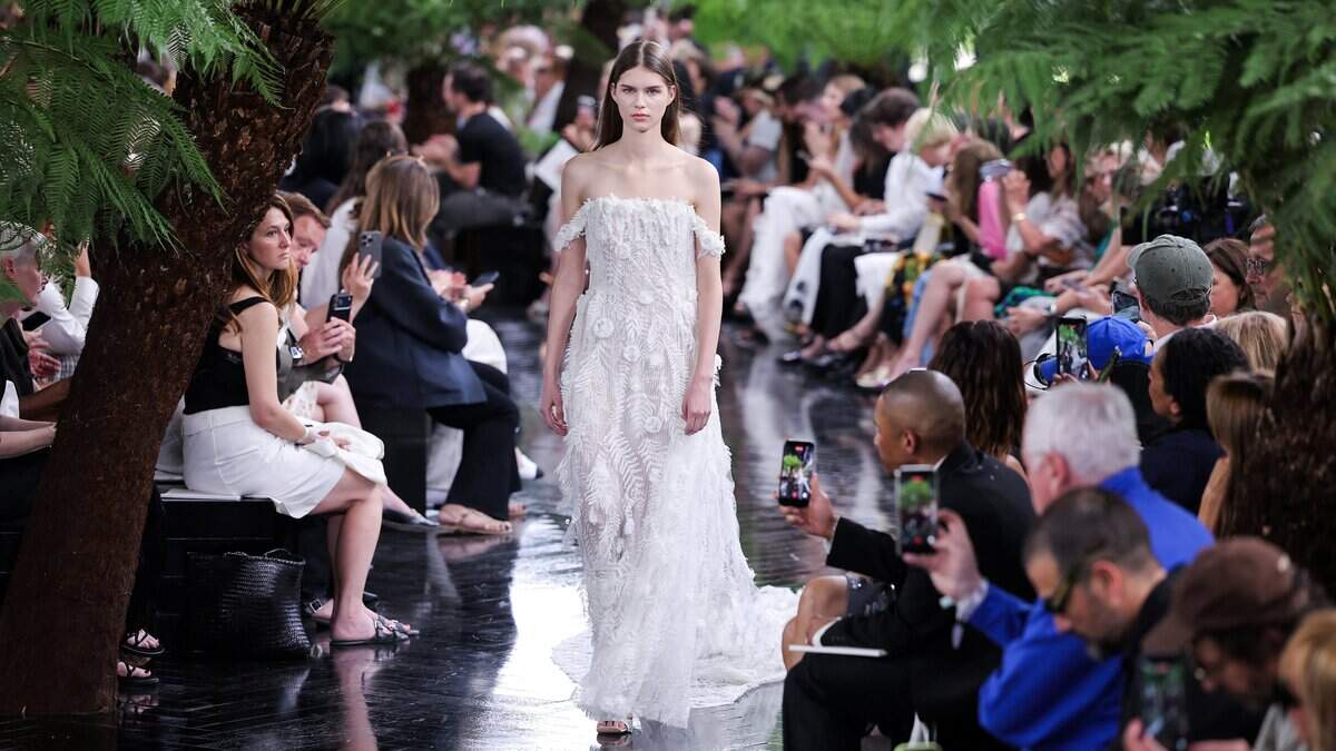 A model presents a creation for Christian Dior for the Women Haute Couture Fall/Winter 2026-2027 collection as part of the Paris Fashion Week, in Paris, on July 6, 2026.