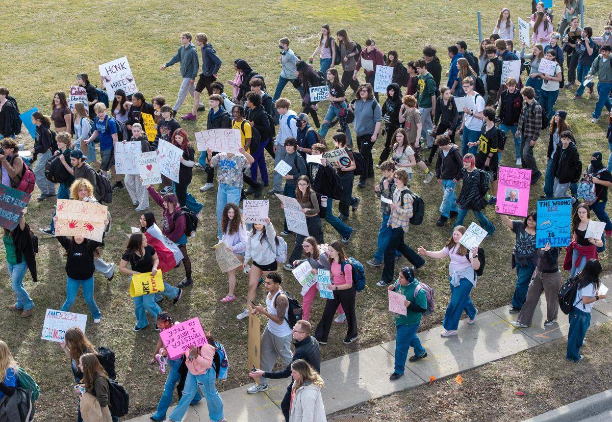 Students at Shawnee Mission North High School marched in protest of ICE and the Trump administration along Johnson Drive on Wednesday, February 11, 2026, in Overland Park.