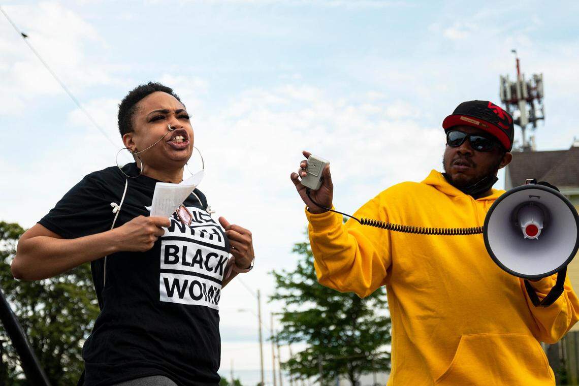 M’vyonne Payne speaks to people gathered Wednesday, June 1, 2022, to protest the Kansas City police shooting of Leonna Hale, 26, of Kansas City, Kansas suspected of a carjacking at the Family Dollar, 634 Prospect Ave., on Friday, May 27, 2022. Hale was charged Wednesday with unlawful firearm possession, exhibiting a firearm and resisting arrest, Prosecutor Jean Peters Baker’s office said.