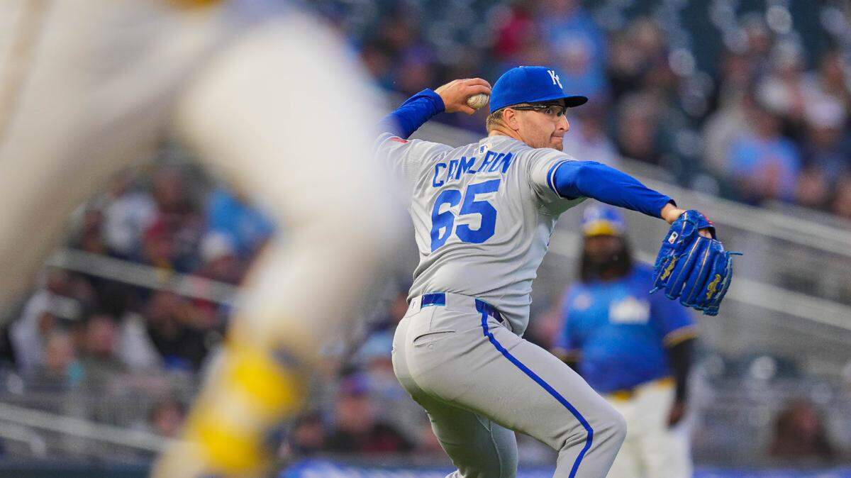 Kansas City Royals pitcher Noah Cameron (65) throws to first base against the Minnesota Twins in the sixth inning at Target Field on May 23, 2025.