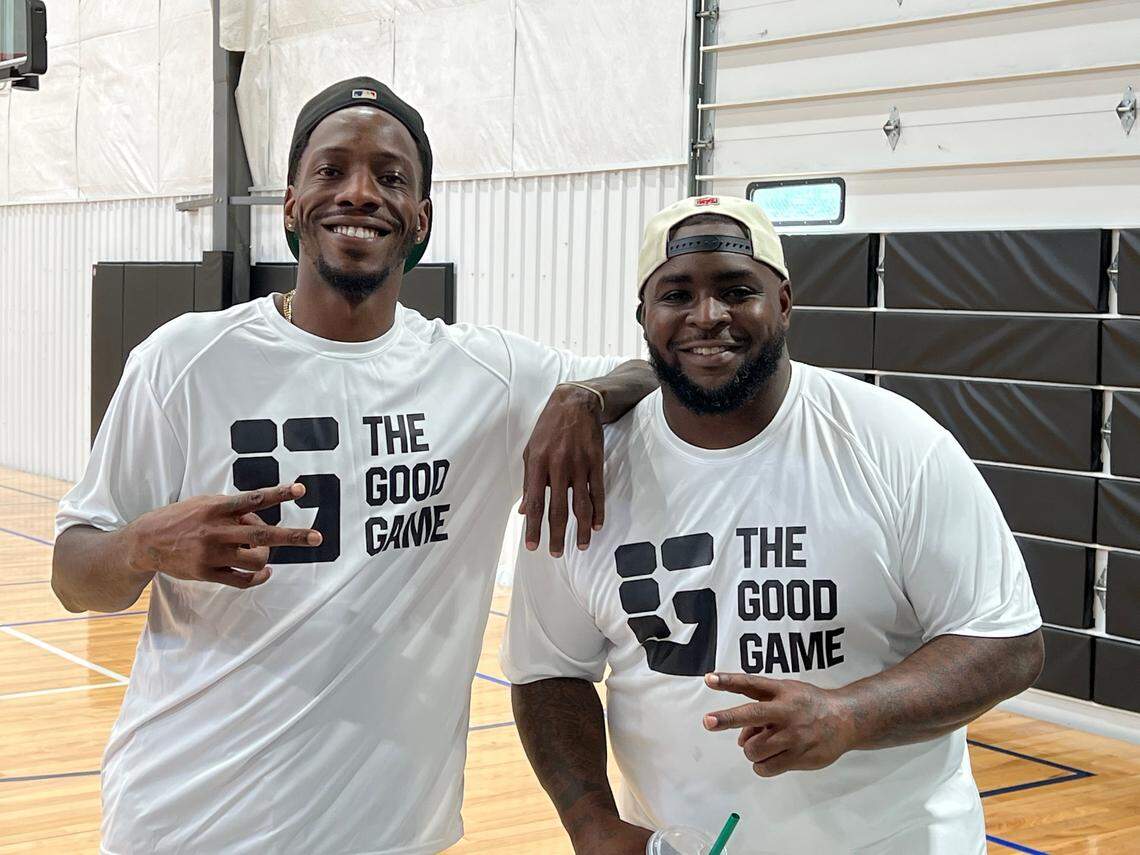 KU alumni team coach Sherron Collins, right, and general manager Tyshawn Taylor attended a Mass Street practice on Thursday, July 18, 2024, in Lawrence.