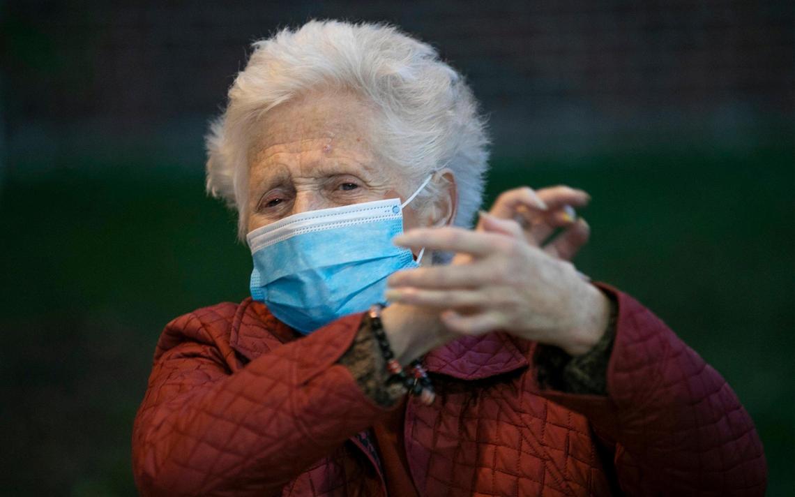 Kay Benjamin, a resident at Aberdeen Village’s independent living, clapped during a concert by Village Presbyterian Church’s brass ensemble.