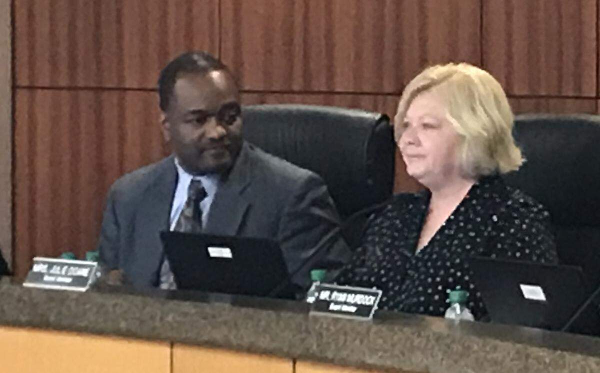 Lee’s Summit Superintendent Dennis Carpenter and school board president Julie Doane at a May meeting.