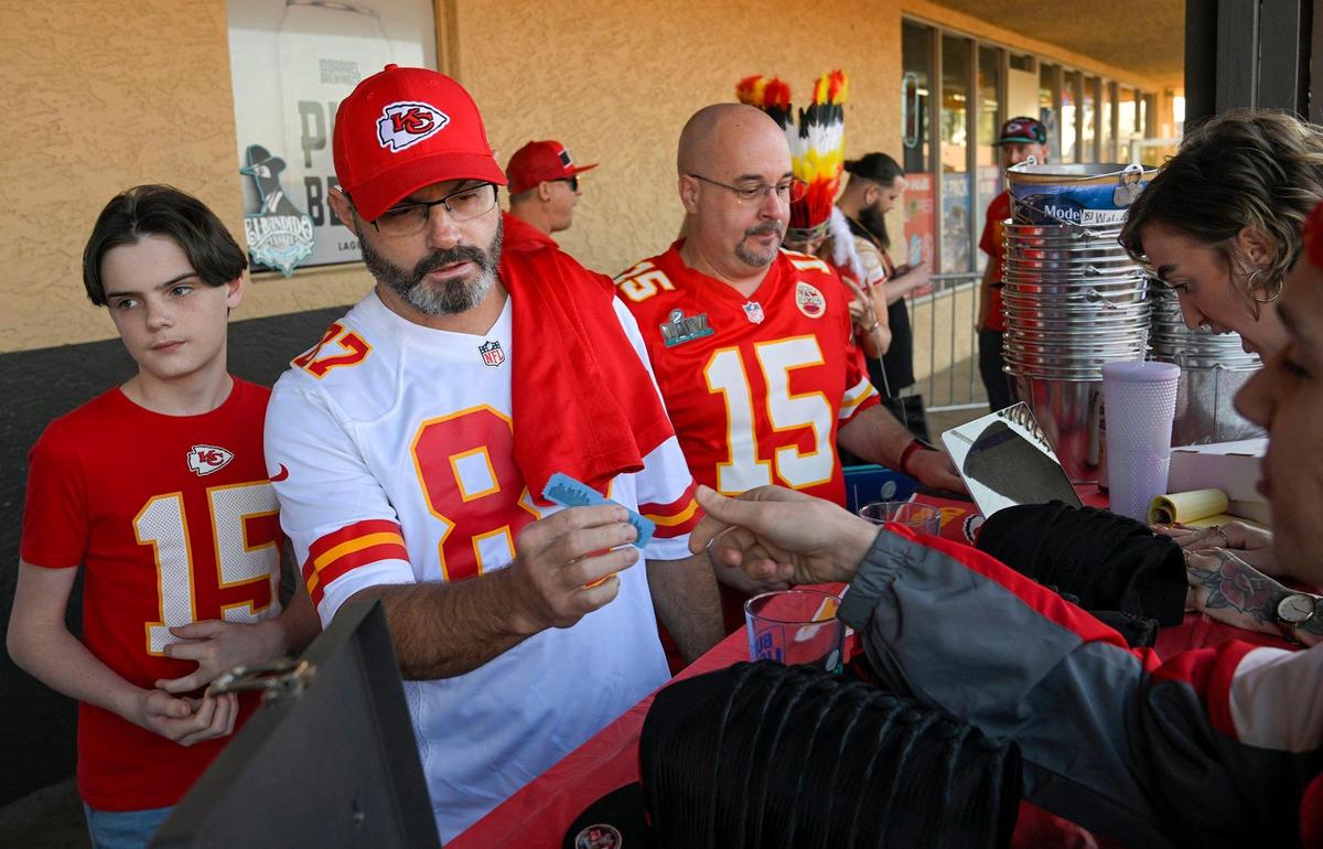 Kansas City Chiefs fans purchased tickets for an autograph signing with former Chiefs greats Nick Lowery, Christian Okoye and Neil Smith gathered Wednesday, Feb. 8, 2023 at Pub Rock Live, a bar with a large following of Chiefs fans.