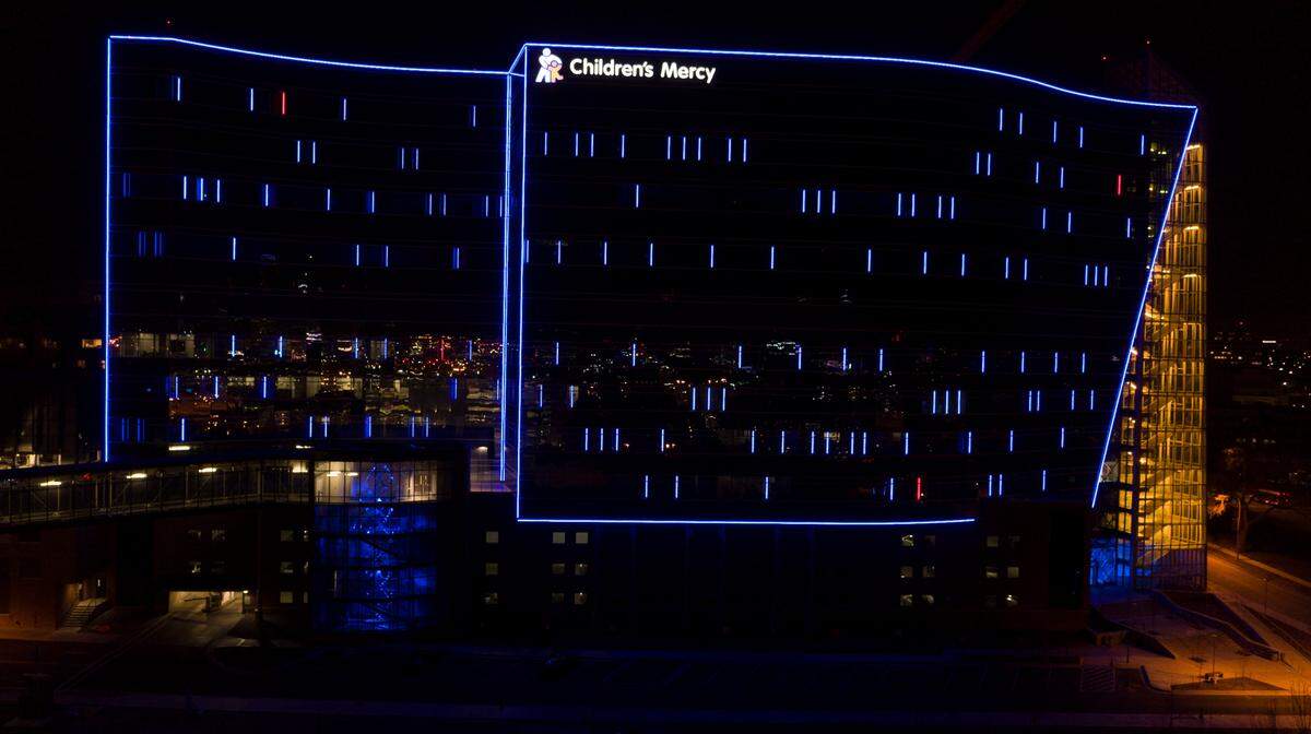 The new Children’s Mercy Research Institute building is striking at night.