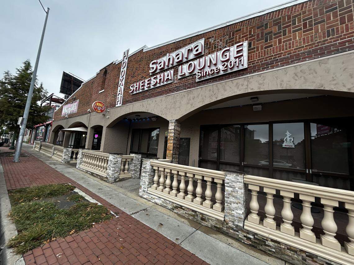 Sahara Sheesha Lounge and Wings Cafe say they have seen declining sales due to parking issues related to their neighbor to the south, Warehouse on Broadway.