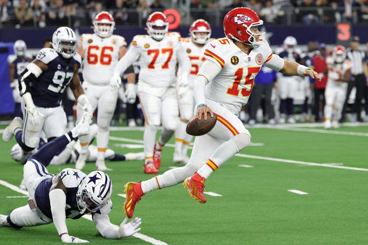 Kansas City Chiefs quarterback Patrick Mahomes takes off for a first down against the Dallas Cowboys during a 31-28 Thanksgiving Day loss in a Week 13 NFL game at AT&T Stadium in Arlington, Texas on Thursday, Nov. 27, 2025.