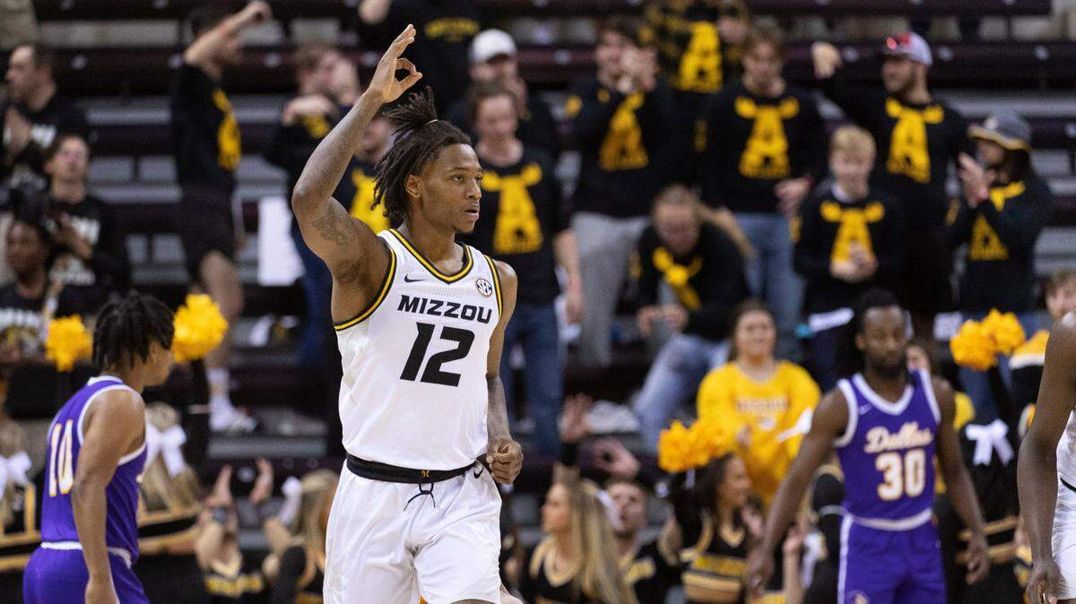 Missouri’s DaJuan Gordon celebrates a three point shot as he runs up court during the first half of an NCAA college basketball game against Paul Quinn Monday, Nov. 29, 2021, in Columbia, Mo. (AP Photo/L.G. Patterson)