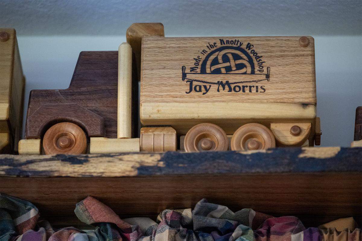 A previous version of a handmade toy truck by Jay Morris of JHM Woodworks sits on a shelf on Tuesday, Dec. 2, 2025, in Lawrence, Kansas. Morris has been donating the handmade trucks to Toys for Tots for the past 12 years.