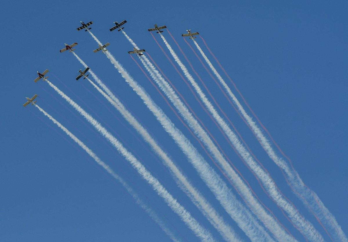 Members of KC Flight, a local group who makes their own planes, flew in formation on the second and final day of the 2021 Kansas City Airshow at the New Century AirCenter in New Century, Kansas, July 4, 2021.