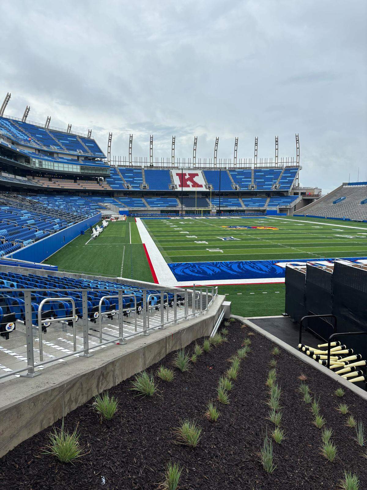 A giant "K" is emblazoned on the new seats in a the renovated north end of David Booth Kansas Memorial Stadium. Kansas athletics director Travis Goff called the seats in the old stadium end zone "worst seat in the sport in the old world."