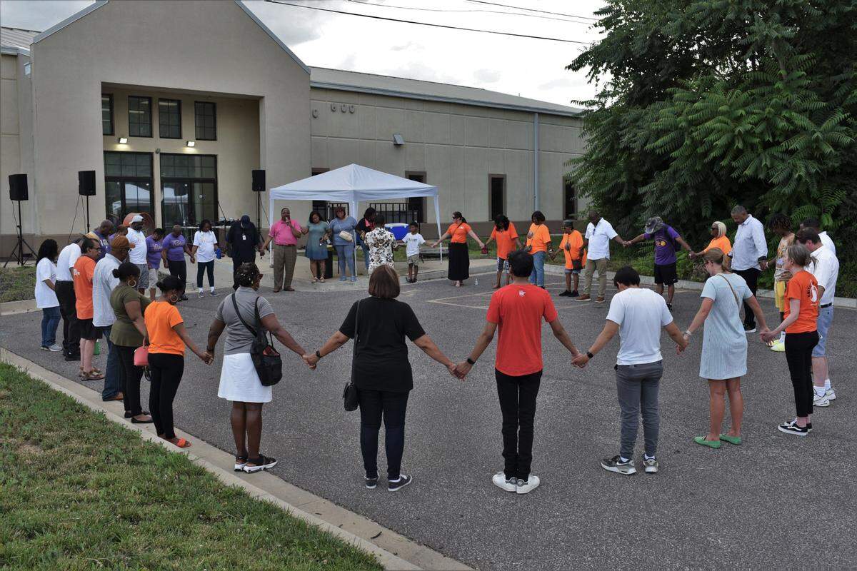 Kansas City activists, clergy and residents gathered Friday evening at the Greater Metropolitan Church of Christ at 37th Street and Prospect Avenue for a prayer vigil addressing violent crime.