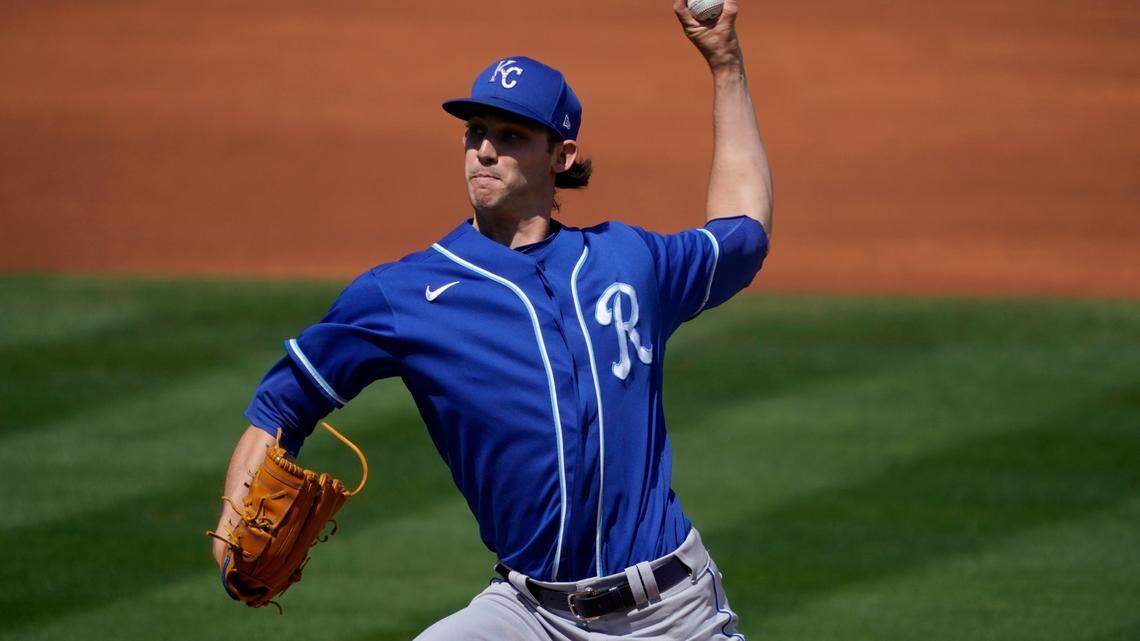 Kansas City Royals starting pitcher Daniel Lynch throws against the Los Angeles Angels during the first inning of a spring training baseball game, Wednesday, March 24, 2021, in Tempe, Ariz. (AP Photo/Matt York)