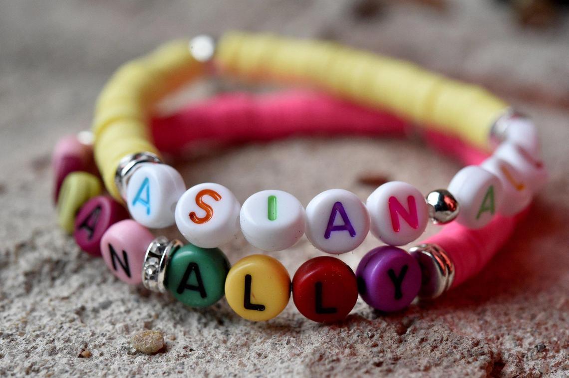 Cafe Cà Phê in the West Bottoms sells bracelets to support AAPI — Asian Americans and Pacific Islanders.