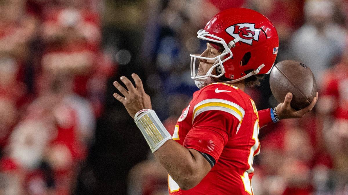 Kansas City Chiefs quarterback Patrick Mahomes (15) winds up to throw a touchdown pass to wide receiver Xavier Worthy (1) in the second half against the Baltimore Ravens on Thursday, Sept. 5, 2024, at GEHA Field at Arrowhead Stadium. Kansas City defeated Baltimore 27-20.