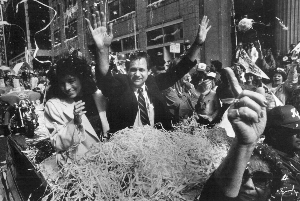 With his team crowned 1985 World Series champions, manager Dick Howser and his wife, Nancy, were overwhelmed with confetti during the celebration parade down Grand Boulevard.