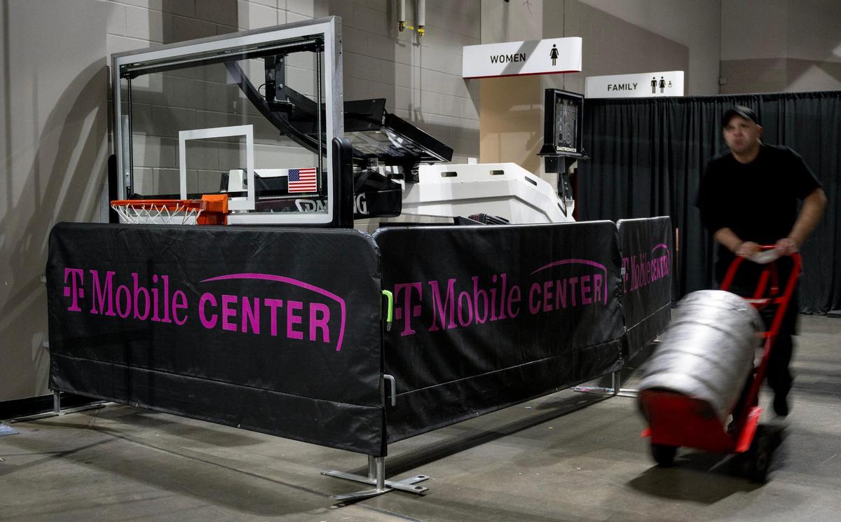 The basketball goals at the Big 12 tournament get a lot of use and sometimes need repaired or replaced A food service worker rolled a keg of beer to a cooler past a spare goal waiting in the wings Wednesday at T-Mobile Center.