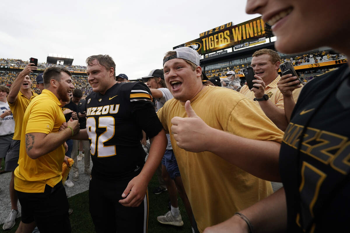 Place kicker Harrison Mevis #92 of the Missouri Tigers Celebrates with fans after kicking the game-winning field goal against the Kansas State Wildcats at Faurot Field/Memorial Stadium on September 16, 2023 in Columbia.