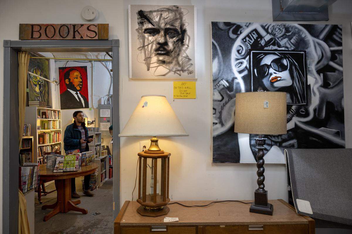 Artwork, which is not for sale, is displayed at Troost39, a thrift store, 3922 Troost Ave., on Thursday, Jan. 15 2026, in Kansas City. Troost39 is a supporter on local Black artists and displays many pieces of art in the store.