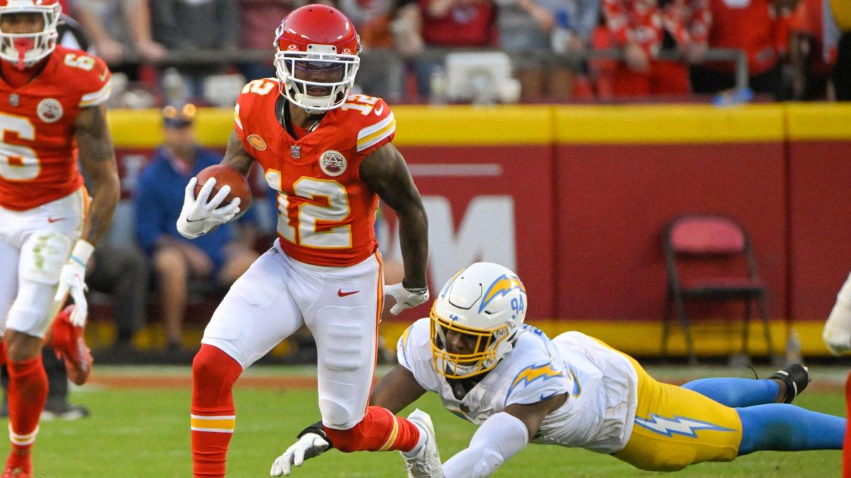 Chiefs wide receiver Mecole Hardman, left, returns a punt against the Los Angeles Chargers during an Oct. 23 game at GEHA Field at Arrowhead Stadium.