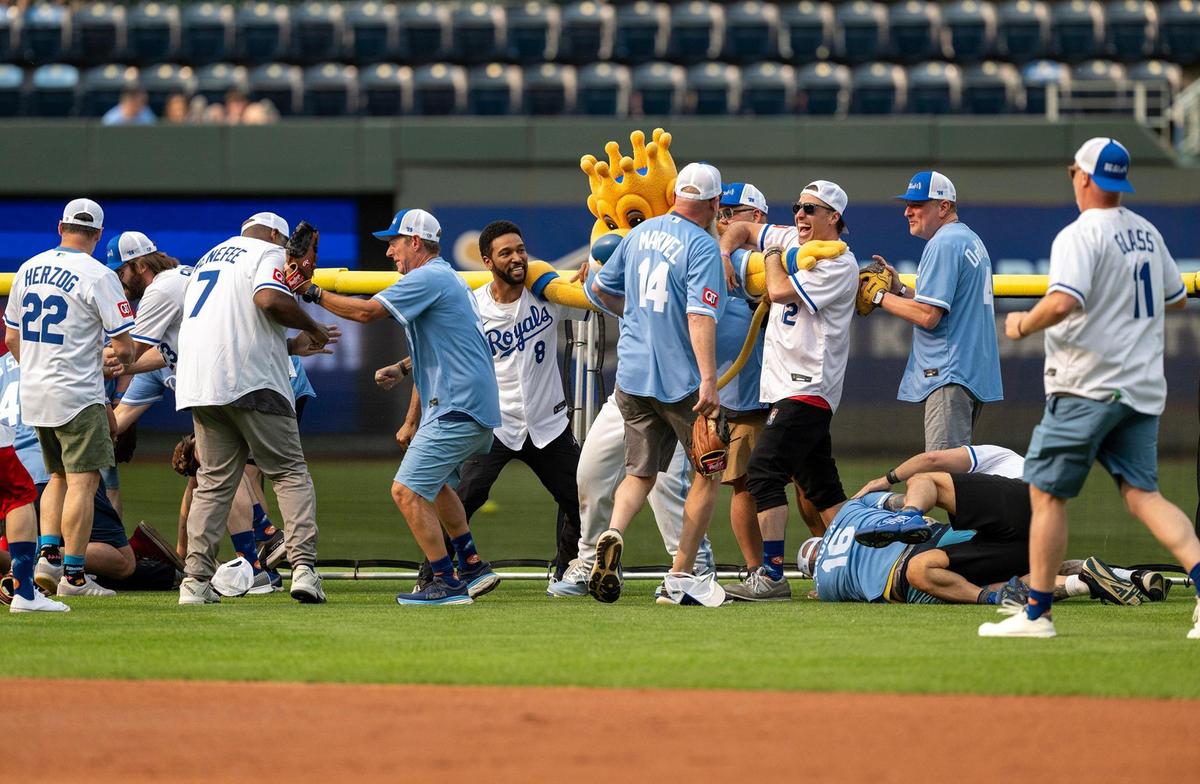 A brawl in the outfield during the Big Slick Celebrity Softball game on Friday, May 30, 2025, at Kauffman Stadium in Kansas City.