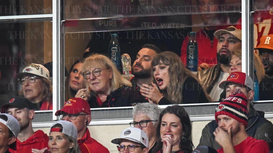 Taylor Swift cheers from a suite while sitting next to Donna Kelce during the Kansas City Chiefs vs. Tampa Bay Buccaneers game on Monday, Nov. 4, 2024, at GEHA Field at Arrowhead Stadium.