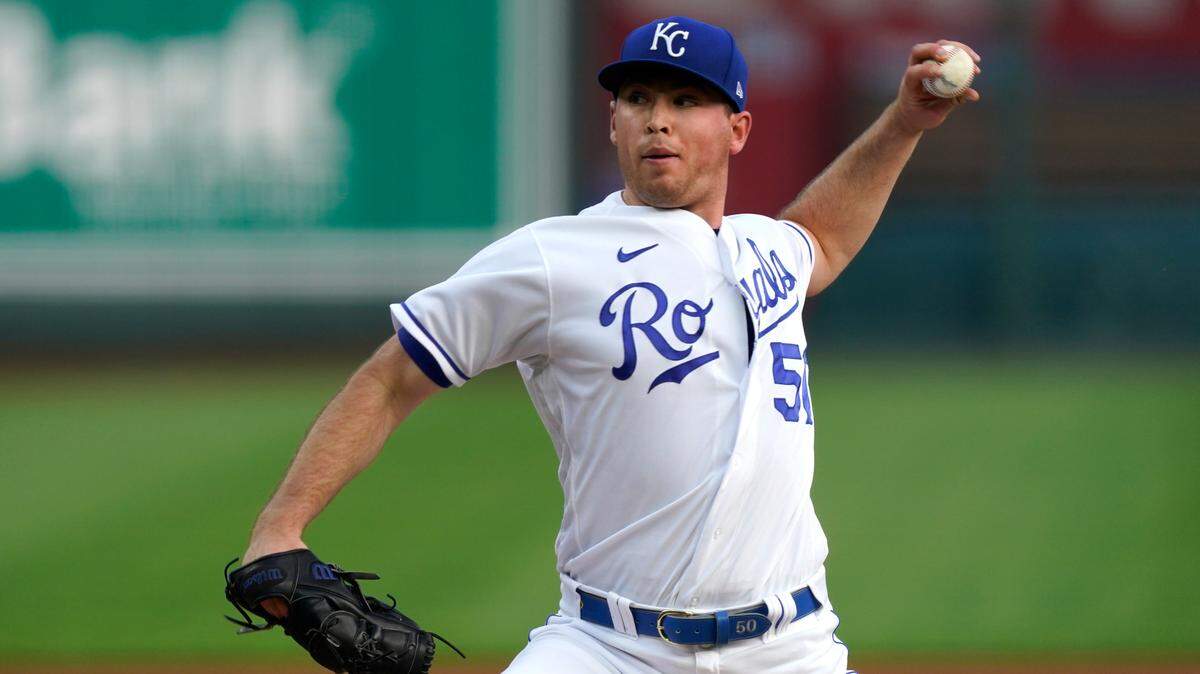 Kansas City Royals starting pitcher Kris Bubic throws during the first inning of a baseball game against the Milwaukee Brewers Tuesday, May 18, 2021, in Kansas City, Mo. (AP Photo/Charlie Riedel)
