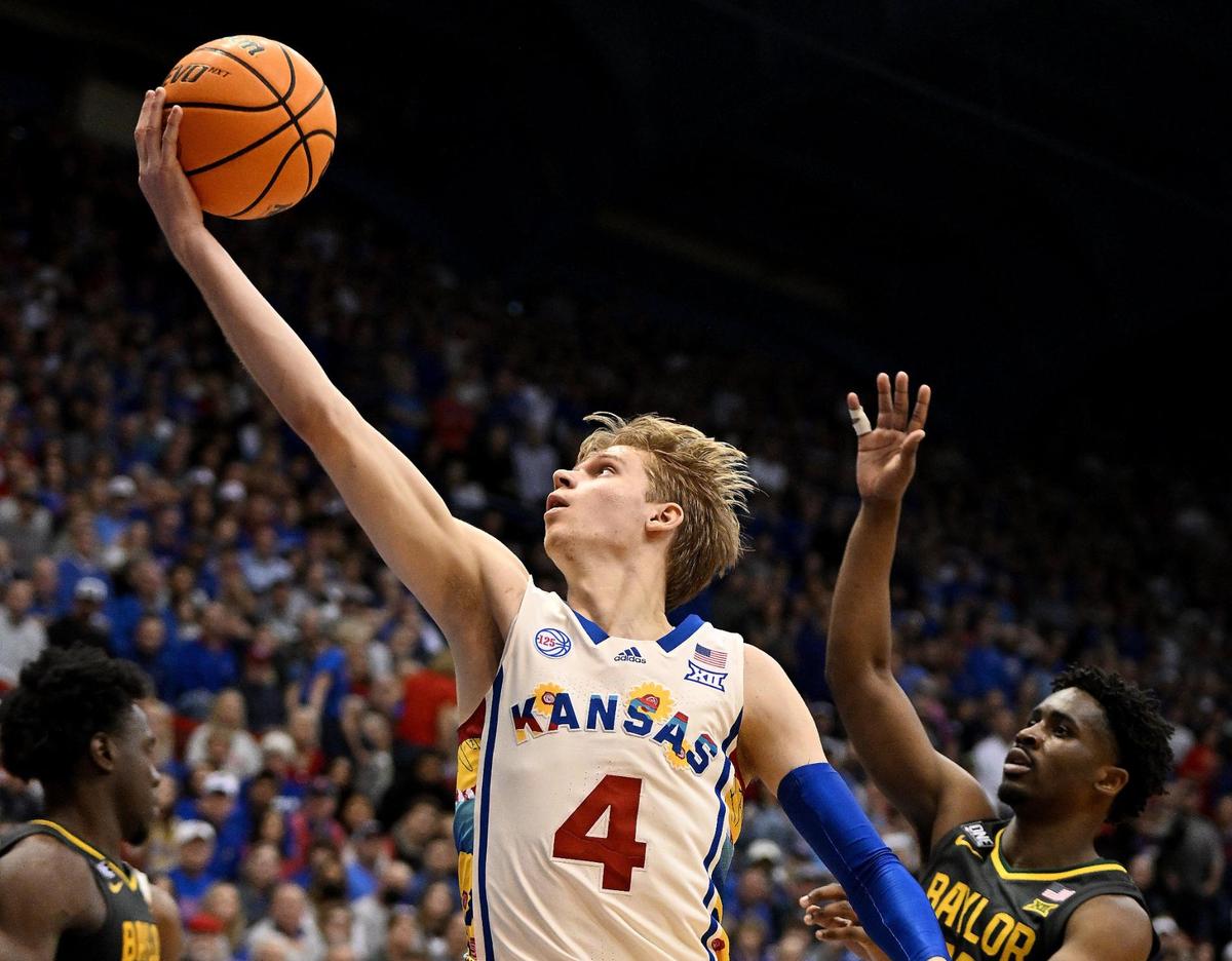 KU’s Gradey Dick blows past Baylor’s Adam Flagler for a shot during a Jayhawk win at Allen Fieldhouse on Feb. 18, 2023.
