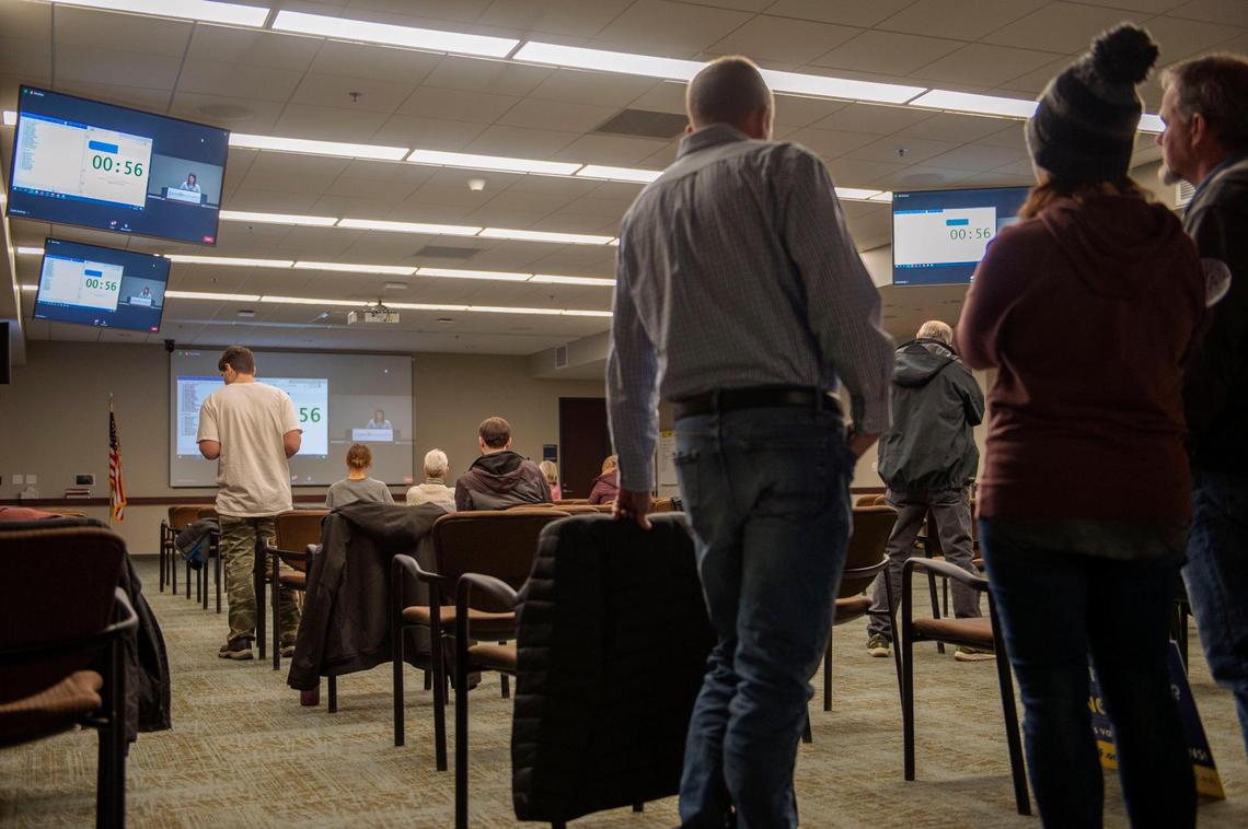 People gathered inside a conference room to listen to public comment in Olathe. The Johnson County Board of Commissioners listened to public comment about eliminating a current mask mandate for children in schools who are up to 11 years old.