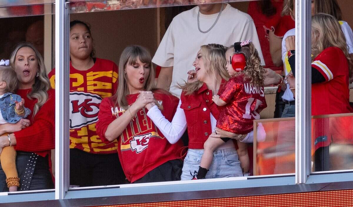 Taylor Swift and Brittany Mahomes celebrate a reception while the Kansas City Chiefs played the Los Angeles Chargers at GEHA Field at Arrowhead Stadium on Sunday, Oct. 22, 2023, in Kansas City.