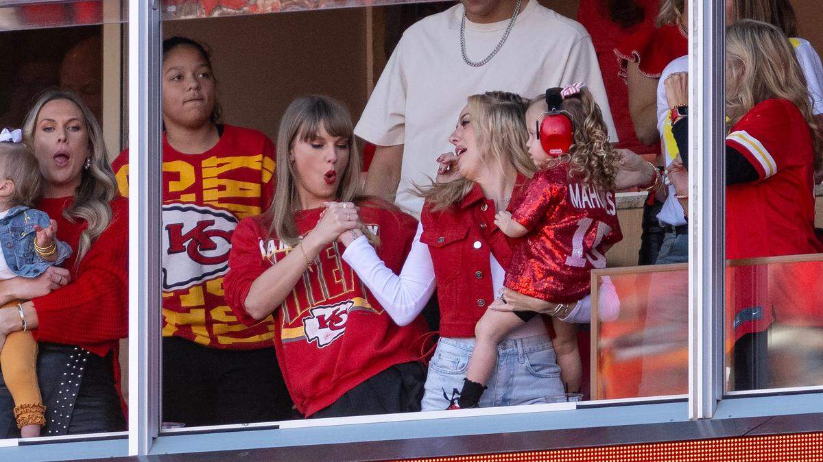 Taylor Swift and Brittany Mahomes celebrate a reception while the Kansas City Chiefs played the Los Angeles Chargers at GEHA Field at Arrowhead Stadium on Sunday, Oct. 22, 2023, in Kansas City.