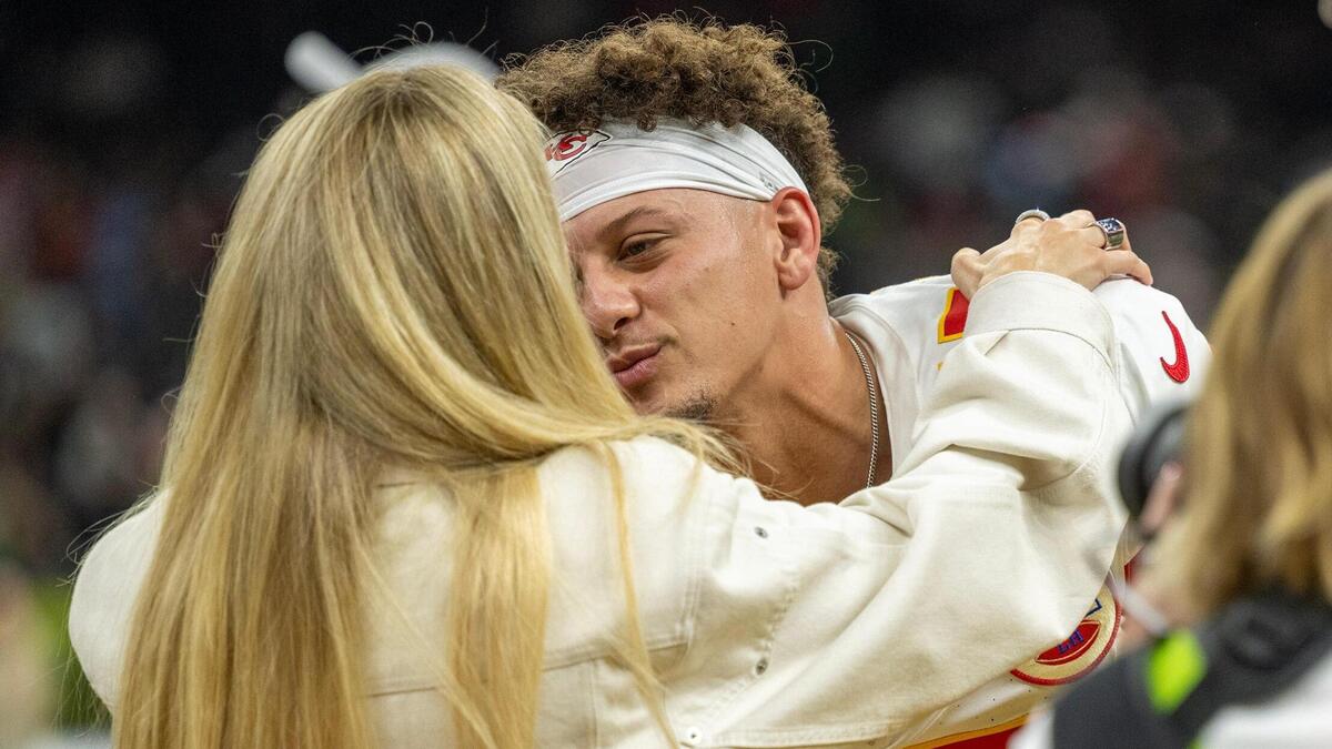 Kansas City Chiefs quarterback Patrick Mahomes and his wife Brittany - seen here sharing a kiss before Super Bowl LIX in February - celebrated their third wedding anniversary this week.