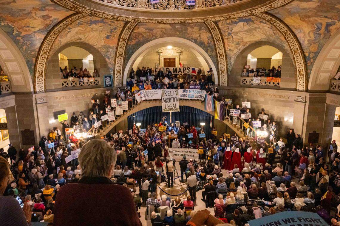 Protesters hold signs and chant in the Missouri State Capitol rotunda on Wednesday, January 21, 2026 in Jefferson City. Organizations and allies gathered to protest recent Missouri lawmaker's decisions.