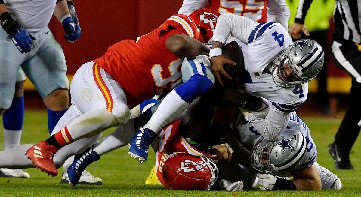 Kansas City Chiefs defensive tackle Chris Jones, left, sacks Dallas Cowboys quarterback Dak Prescott during the fourth quarter of Sunday’s NFL game at Arrowhead Stadium. Kansas City beat Dallas, 19-9.