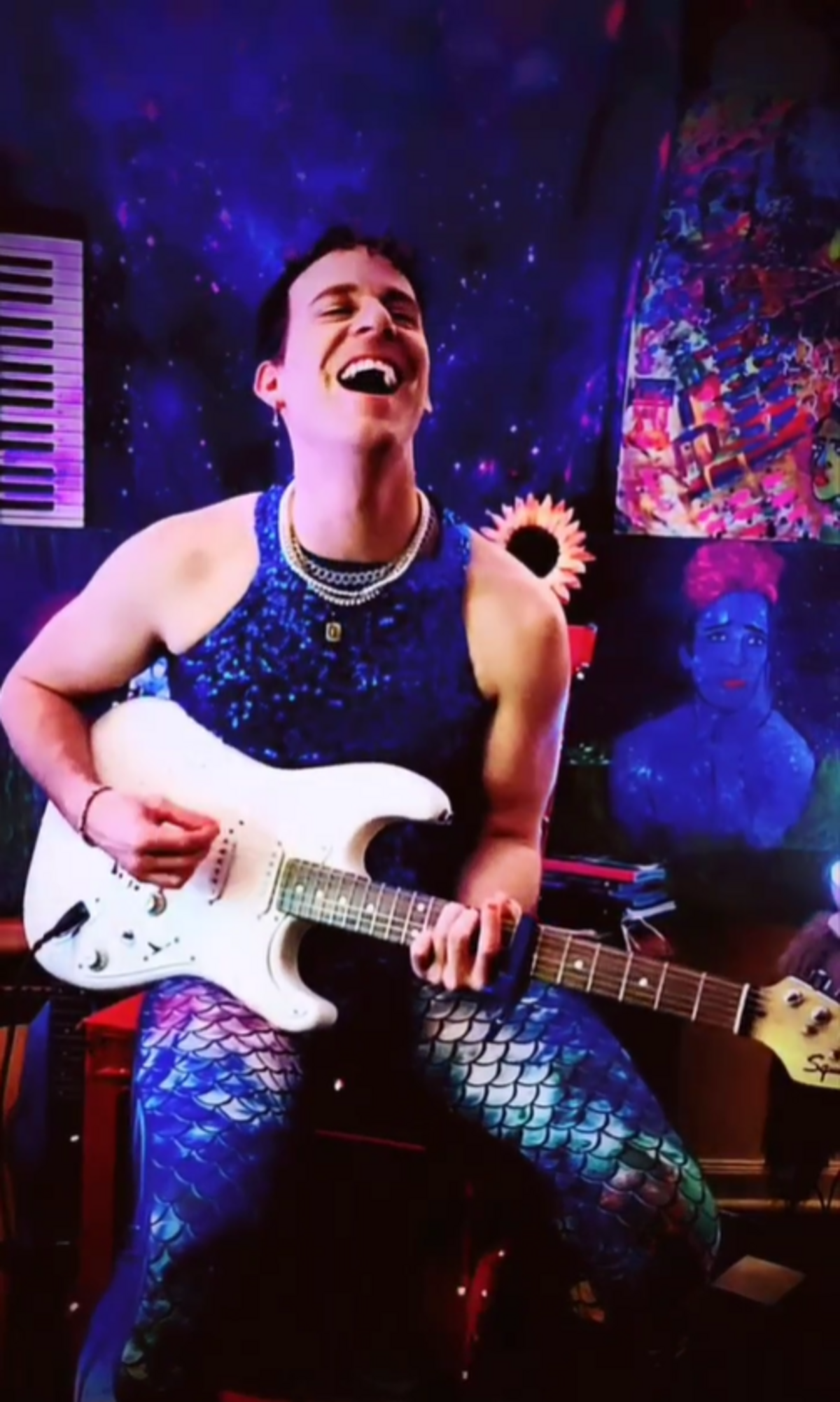 A still from a video of Louise ImMasche singing on their Instagram account.