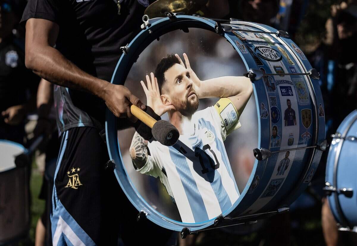 A drum with an images of Argentine superstar Lionel Messi was part of a rally at Mill Creek Park on Monday night. Argentina will begin their World Cup title defense against Algeria on Tuesday at Kansas City Stadium.