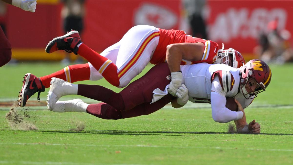Kansas City Chiefs defensive end George Karlaftis sacks Washington Commanders quarterback Carson Wentz in the first half on Saturday, Aug. 20, 2022, at Arrowhead Stadium in Kansas City.