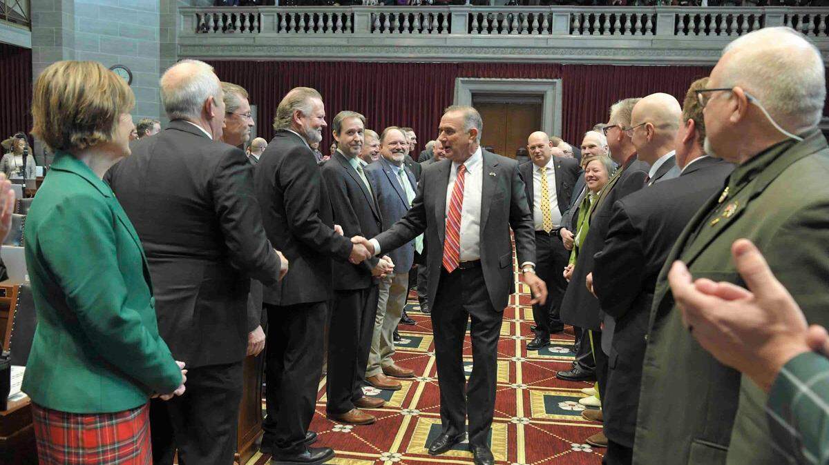 Missouri Gov. Mike Kehoe enters the House chamber ahead of his State of the State speech.
